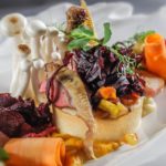 Kreation beim HUG-Wettbewerb 2018 mit Pastinake, Taube, Urkarotte und Rotkraut. Foto: HUG